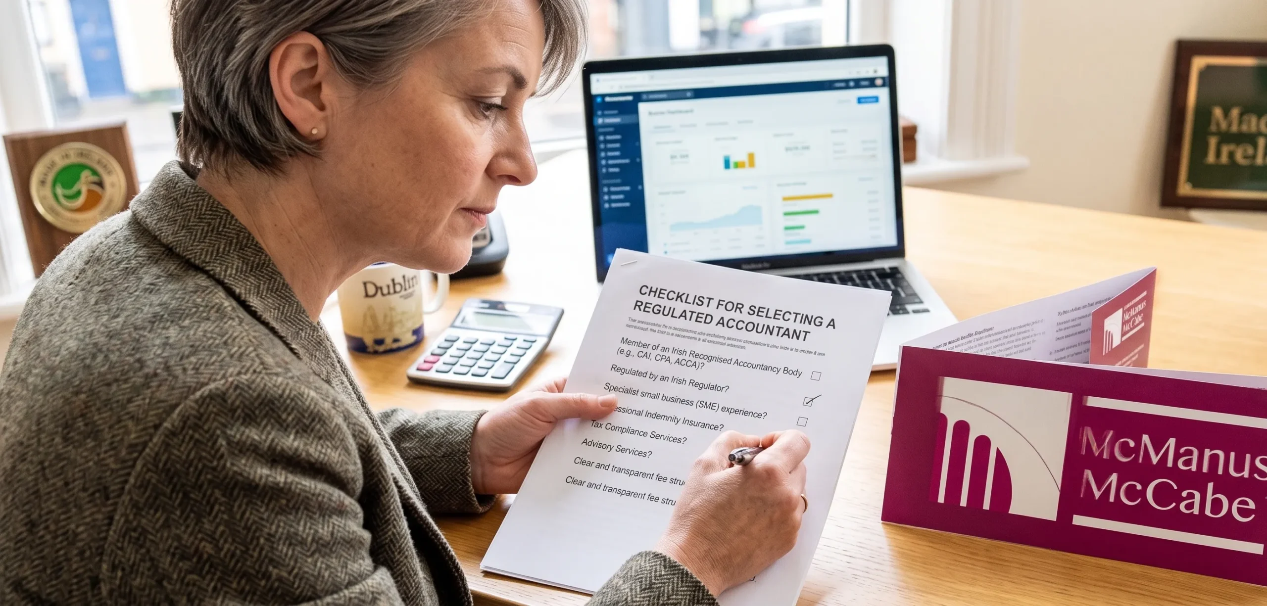 A small business owner in Ireland reviewing a qualification checklist to choose a regulated accountant for their enterprise